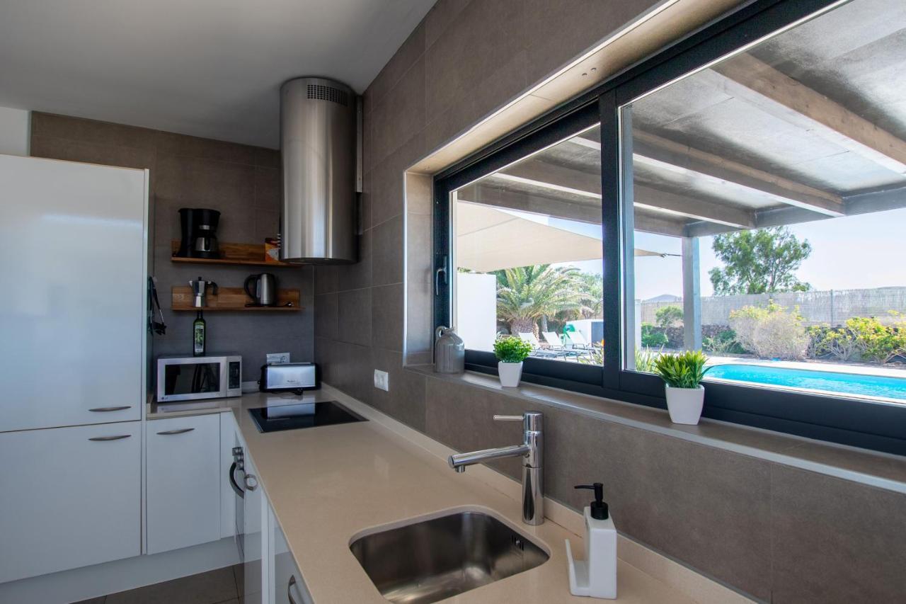 Heated & Shared Pool Villa Matriana 36A, North Shore Villas Lajares Bagian luar foto